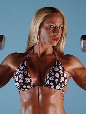 Blonde MILF bodybuilder Jill Rudison flaunts her oiled body while working out