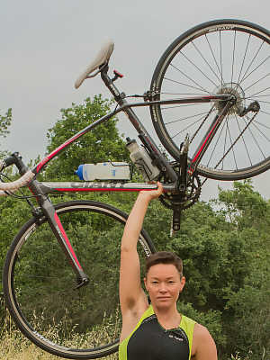 Amateur bicyclist Jiz Lee strips in nature and showcases her hairy body