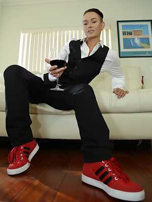 Androgynous short haired model Jiz Lee posing in her male outfit