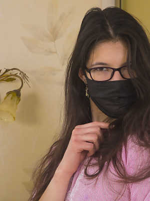 18-year-old geek Juno H doffs a face mask & clothes to pose nude in OTK socks